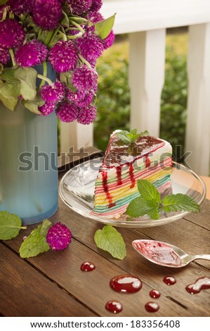 rainbow cake with drops of jam in day light