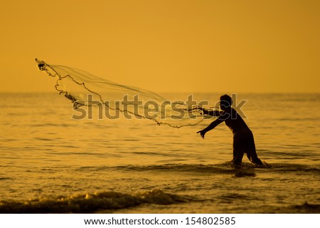 fisherman with net ,Songkhla , Thailand, cast a net
