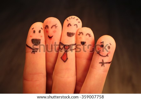 Five school friends finger puppets hugging and having fun together.