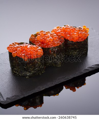 Sushi gunkan on a stone plate