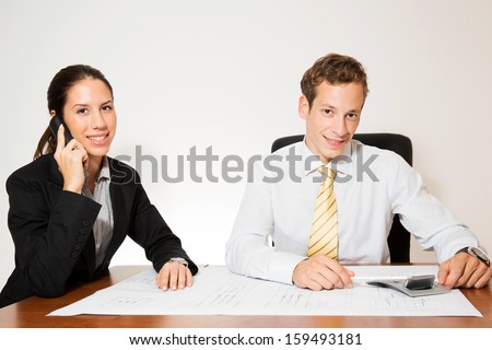 Male and female model(business dressed),in different office scenarios.