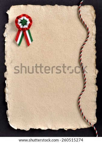 Handmade paper to demanding typo and email. Hungary National Day is March 15th.\
The tricolor ribbon cockade symbol of the celebration.On antiqued color paper.