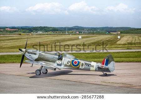 Goteborg, Sweden - June 8, 2013: An old military second world war fighter, Spitfire, at Save Airport in Goteborg a nice summer day.