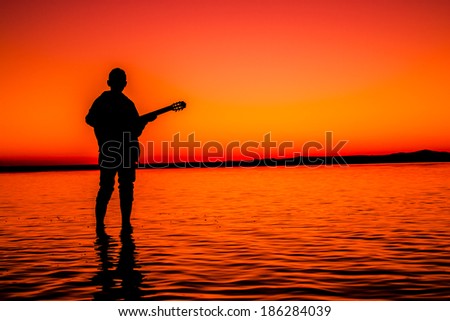 silhouette of man\'s salt lake (salt lake - turkey)