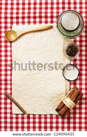blank recipe card and spices on checkered napkin