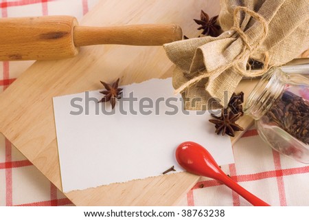 chopping board, spices, rolling pin, sack and empty paper