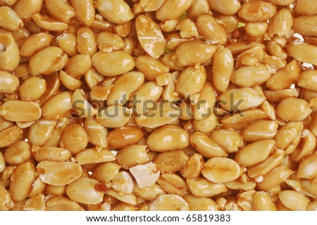 peanut brittle as background close up
