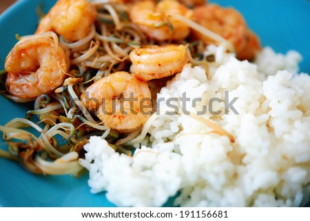 fried shrimps and soy sprouts with rice