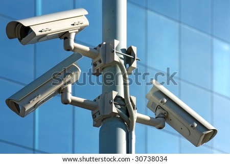 three security cameras