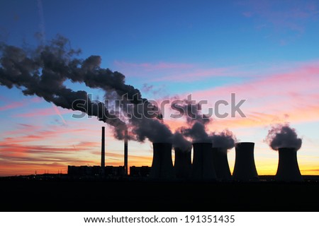 dramatic sunset over coal power plant