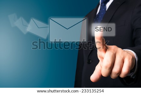 Business person working with modern virtual technology (sending mail)