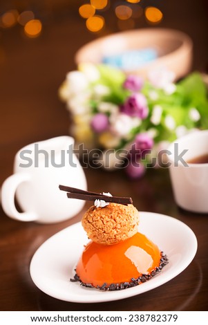 Tasty biscuit cake with jelly on the white plate