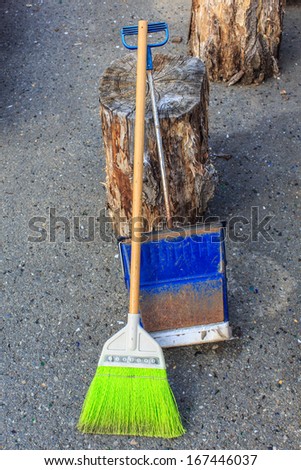 plastic broom and dustpan