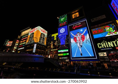 OSAKA, JAPAN - APRIL 12: The Glico Man light billboard and other light on Aprir 12 2015 in Dontonbori, Namba area, Osaka, Japan. Namba is now primary tourist destination.