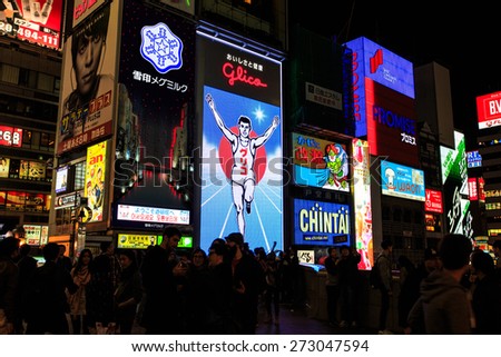 OSAKA, JAPAN - APRIL 12: The Glico Man light billboard and other light on Aprir 12 ,2015 in Dontonbori, Namba area, Osaka, Japan. Namba is now primary tourist destination.