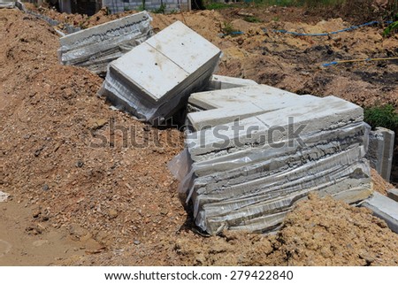 pile of concrete slabs road construction in thailand