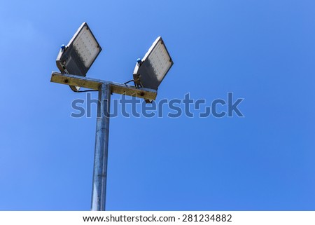 LED street lamps with energy-saving technology, on sky background