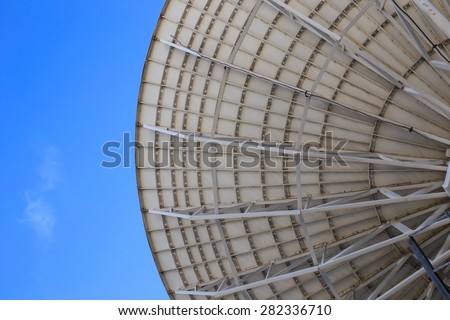 close up of back of satellite dish with sky background