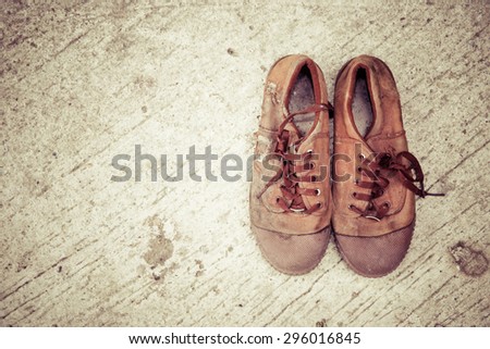 Old brown canvas shoes,Student shoes men in thailand.