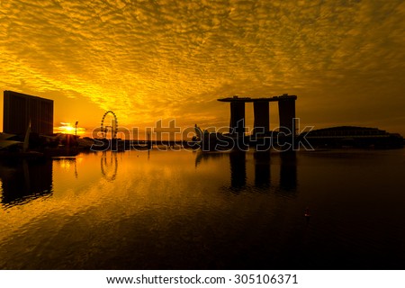 SINGAPORE-AUGUST 1, 2015: Silhouette of Marina Bay Sands hotel and view of Marina Bay in Singapore with amazing cloud in morning.