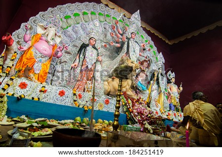 KOLKATA , INDIA - OCTOBER 12, 2013 : Durga Puja festival celebration. It is the biggest religious festival of Hinduism.