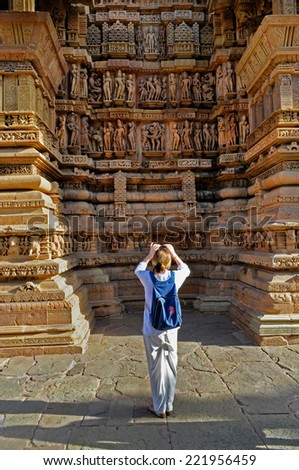 KHAJURAHO, MADHYAPRADESH / INDIA - MARCH 21ST : Foreign visitor taking picture of Lakshmana Temple, on 21st March 2011 in Khajuraho. It is an UNESCO world heritage site and popular world tourist spot.