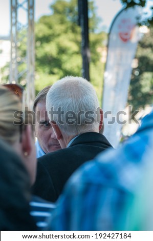 STOCKHOLM, SWEDEN - AUGUST 25: Stefan Lofven, party leader for the Swedish Social Democrats is interviewed by the press after his summer speech in Vasaparken, Stockholm, August 25, 2013.