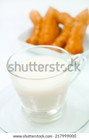 Soybean milk with fried bread stick on the white background