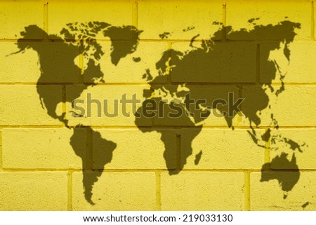 World map on yellow wallpaper background