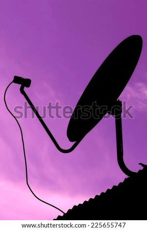 silhouettes television satellite on roof house