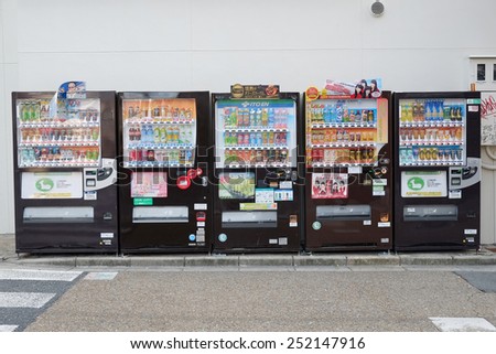 KYOTO, JAPAN - DECEMBER 30, 2014: Vending machine with hot and cold drink is everywhere in the capital of Kyoto , Japan