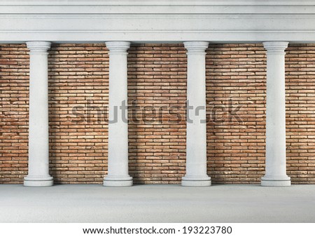 Antique columns on brick background