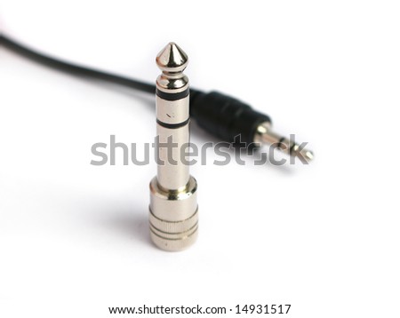 Headphone plug adapter with wire isolated on white background