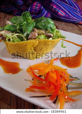 Mexican vegetables and chicken salad, in a mexican restaurant.