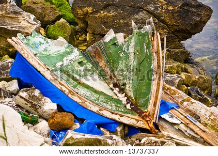 Broken boat on the rocks of Varna. Bulgaria.