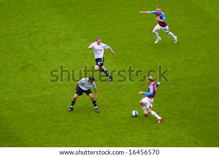 LONDON - APRIL 19: Swedish captain Ljundberg (R) leads a fast paced counter attack during the West Ham vs Derby County game on April 19, 2008 in London.