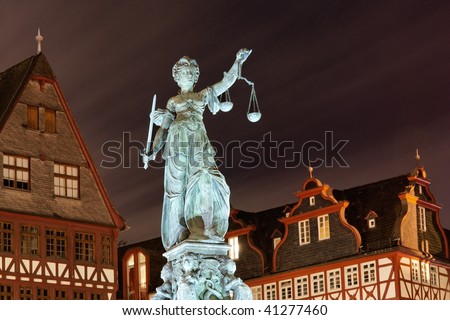 Lady Justice by night in Frankfurt. Germany.