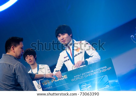 HANNOVER - MARCH 04.  Korean player Ace receiving the first place prize at Starcraft II IEM on March 4, 2011 in Hannover, Germany.