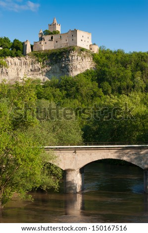 Train bridge over the river and Rudelsburg castle in spring, Thuringia, Germany