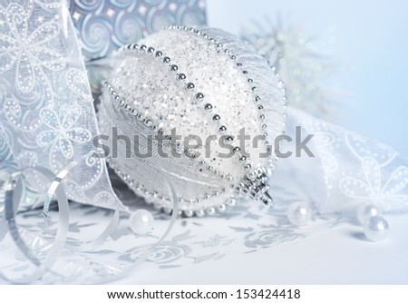 Closeup on Christmas decorations in silver and white