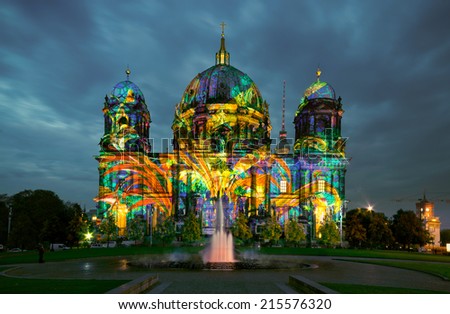 BERLIN, GERMANY - OCTOBER 14: Berliner Dome illuminated during FESTIVAL OF LIGHTS on October 14, 2013  in Berlin, Germany. This colorful show attracts many tourists and residents alike