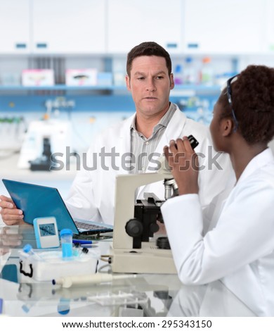Scientists work in histological lab