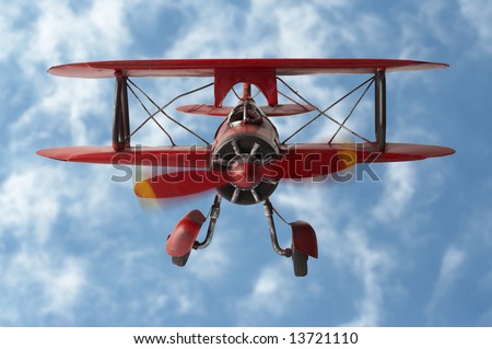 A model plane on cloud background. grumman g-5 1933 plane