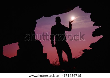 Man with moon in hand