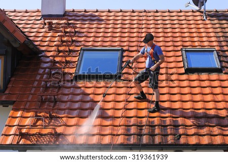Roof cleaning with high pressure