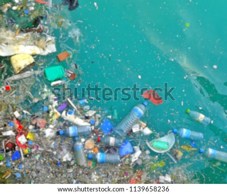 Blur background of garbage patch pollution in ocean
