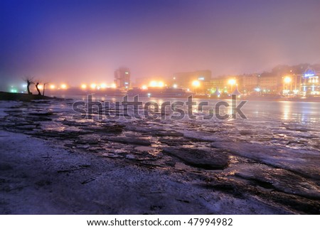 Quay of the big city. Winter. Fog. Night. Rostov-on-Don. Russia