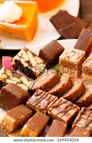 assorted cakes and baked pumpkin