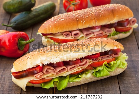 Homemade Italian Sub Sandwich with Salami, Tomato and Lettuce