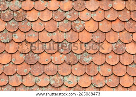 Old red brick roof tiles background